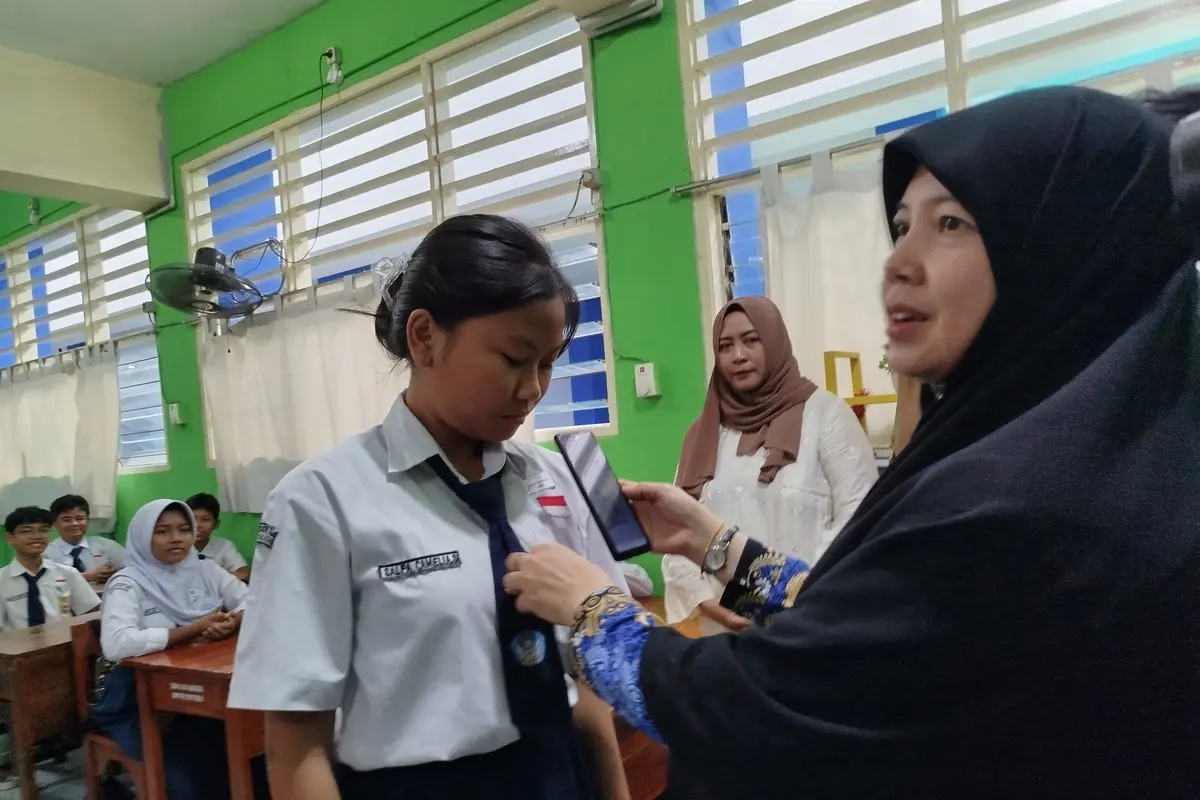 Uji coba makan bergizi gratis di SMPN 161, Jakarta Selatan pada Kamis (19/9/2024).