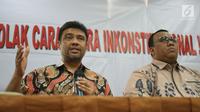 Presiden KSPI Said Iqbal (kiri) dan Presiden KSPSI Andi Gani Nena Wea saat konferensi pers, Jakarta, Rabu (25/9/2019). Kendati menilai revisi UU No 13/2003 tentang Ketenagakerjaan merugikan buruh, serikat pekerja meminta buruh menahan diri dan mengedepankan keutuhan NKRI. (Liputan6.com/Angga Yuniar)