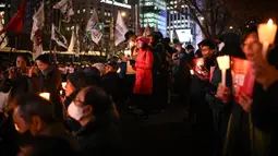Oposisi Korea Selatan terus bergerak untuk memakzulkan Yoon pada tanggal 4 Desember setelah pemberlakuan darurat militer yang luar biasa namun hanya berlangsung singkat. (Philip FONG/AFP)