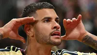 Gelandang Arsenal, Bruno Guimaraes, merayakan gol yang dicetaknya ke gawang Sunderland dalam lanjutan Premier League 2026/2027 di Stadium of Light, Minggu (13/9/2026) dini hari WIB. (Oli SCARFF / AFP)