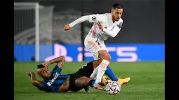 Eden Hazard (kanan) sampai saat ini masih berkostum Real Madrid walaupun dirinya lebih sering cedera belakangan ini. (Foto: AFP/Pierre-Philippe Marcou)