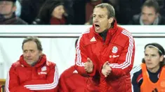 Bayern Munich's coach Juergen Klinsmann reacts to Stuttgart's equalizer during the German first division Bundesliga match VfB Stuttgart vs FC Bayern Munich in Stuttgart on December 13, 2008. AFP PHOTO/OLIVER LANG