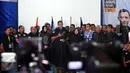 Agus Harimurti Yudhoyono ditemani calon wakil gubernur Sylviana Murni dan juga istrinya Annisa Pohan saat menggelar konferensi pers di Posko Kemenangan AHY-Sylvi di Wisma Proklamasi, Jakarta, Rabu (15/2). (Liputan6.com/Johan Tallo)