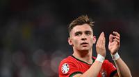 Ekspresi pemain Portugal, Francisco Conceicao usai menjebol gawang Republik Ceska pada matchday 1 Grup F Euro 2024 di Red Bull Arena, Leipzig, Rabu (19/6/2024) dini hari WIB. (PATRICIA DE MELO MOREIRA / AFP)
