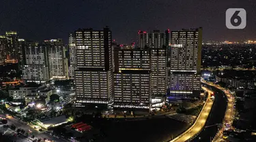 Foto udara memperlihatkan suasana Rumah Sakit Darurat Wisma Atlet, Kemayoran, Jakarta, Kamis (10/9/2020). Pemerintah menyiapkan 2.700 tempat tidur di Rumah Sakit Darurat Wisma Atlet untuk merawat pasien COVID-19 dengan kondisi sedang dan ringan. (Liputan6.com/Faizal Fanani)