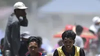 Tradisi pacuan kuda di Gayo, Takengon, Aceh Tengah, yang diikuti para joki cilik yang gagah berani (Chaideer Mahyuddin/AFP)