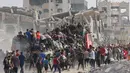 Sementara 26 orang lainnya tewas akibat serangan di area dekat pusat distribusi bantuan Gaza, yang dikenal sebagai koridor Netzarim, yang dikuasai Israel. (Omar AL-QATTAA/AFP)