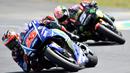 Sejak awal laga Maverick Vinales saling susul-susulan dengan Johann Zarco dan rekan setimnya Valentino Rossi. (AFP/Jean-Francois Monier)