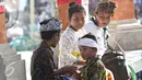 Anak-anak juga ikut dalam acara Dharmasanti Provinsi DKI Jakarta di Pura Dalem Purnajati Tanjung Puri, Jakarta, (26/3). (Liputan6.com/Immanuel Antonius)