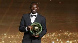 Sadio Mane juga turut membantu Liverpool menjuarai Carabao Cup serta Piala FA 2021/2022. (Photo by AFP)