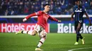 Cristiano Ronaldo lagi-lagi menjadi pahlawan Manchester United. Kali ini CR7 menyelamatkan Setan Merah dari kekalahan saat bersua Atalanta pada laga keempat Grup F Liga Champions, Rabu (3/11/2021). (AFP/Marco Bertorello)