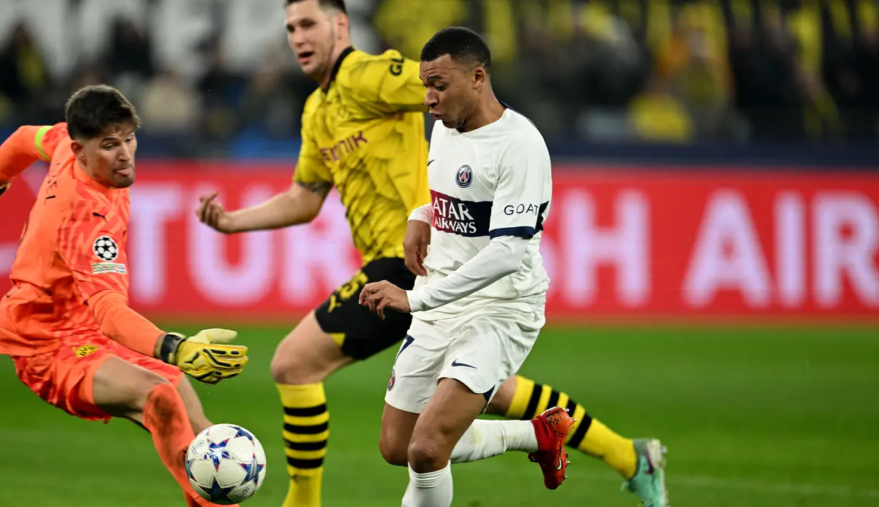 Dortmund tetap perkasa di puncak klasemen grup F dengan mengoleksi 11 poin. (INA FASSBENDER / AFP)