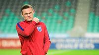 Kapten tim nasional Inggris, Wayne Rooney. (AFP/Jure Makovec)