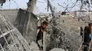 Di sisi lain, beberapa rumah sakit yang masih beroperasi di Gaza berada pada kondisi yang mengkhawatirkan. Kondisi tempat tidur yang penuh dan ketersediaan antibiotik yang terbatas, membuat rumah sakit kesulitan untuk menampung korban lonjakan. (Eyad BABA/AFP)