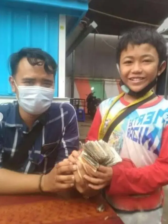 bocah jadi tukang parkir