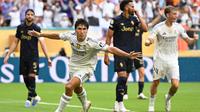 Ekspresi penyerang Real Madrid, Gonzalo Garcia, saat tandukannya berbuah gol ke gawang Juventus dalam laga 16 besar Piala Dunia Antarklub 2025 di Hard Rock Stadium, Miami, Rabu (2/7/2025) dini hari WIB. Real Madrid menang 1-0 atas Juventus untuk lolos ke perempat final. (Patricia DE MELO MOREIRA / AFP)