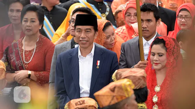 [Bintang] Jokowi dan Iriana Medan