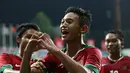 Ekspresi pemain Indonesia U-23, Muchlis Hadi Ning Syaifulloh, mencetak gol keempat ke gawang Kamboja U-23. (Bola.com/Arief Bagus)