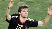 Selebrasi gol striker Jerman Thomas Mueller di laga perebutan tempat ketiga PD 2010 melawan Uruguay di Nelson Mandela Bay Stadium, Port Elizabeth, 10 Juli 2010. Jerman unggul 3-2. AFP PHOTO / CARL DE SOUZA 