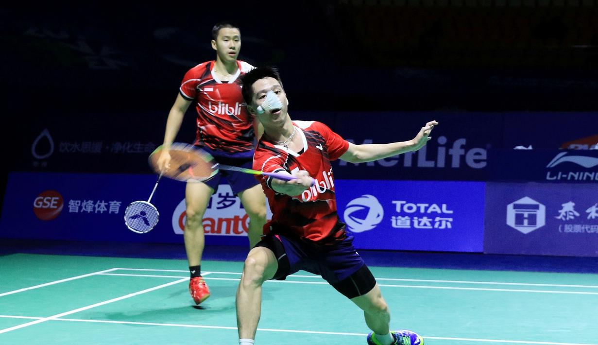 Ganda putra Indonesia, Kevin Sanjaya Sukamuljo/Marcus Fernaldi Gideon  merengkuh titel juara China Terbuka Super Series 2016 usai menundukkan pasangan Denmark, Mathias Boe/Carsten Mogensen, 21-18, 22-20, di Fuzhou, Minggu (20/11/2016). (PBSI)