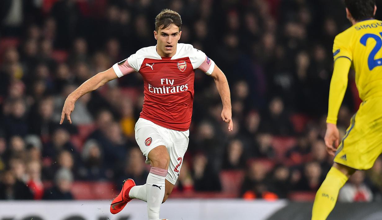 Aksi pemain baru Arseal, Denis Suarez pada leg 2, babak 16 besar Liga Europa yang berlangsung di stadion Emirates, London, Jumat (22/2). Arsenal menang 3-0 atas Bate Borisov. (AFP/Glyn Kirk)