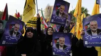 Warga Iran berdemo atas kematian pemimpin politik Hamas, Ismail Haniyeh.(AP/Vahid Salemi)