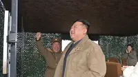 Presiden Korea Utara, Kim Jong-un. (STR / KCNA VIA KNS / AFP).