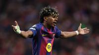 Penyerang sayap Barcelona, Lamine Yamal, bereaksi dalam pertandingan leg kedua perempat final Liga Champions 2025/2026 antara Atlético Madrid dan Barcelona di Stadion Metropolitano, Madrid, pada 14 April 2026. (Oscar DEL POZO / AFP)