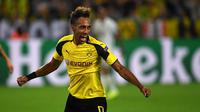 Ekspresi pemain Borussia Dortmund, Pierre-Emerick Aubameyang, setelah mencetak gol ke gawang Real Madrid dalam laga kedua Grup F Liga Champions di Signal Iduna Park, Rabu (28/9/2016) dini hari WIB. (AFP/Patrik Stollarz)