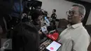 Terdakwa kasus dugaan korupsi pengadaan UPS, Alex Usman memberikan keterangan pers di Pengadilan Tipikor, Jakarta, Kamis (3/3/2016). JPU menuntut hukuman 7 tahun dengan denda Rp 500 juta subsider 6 bulan kurungan. (Liputan6.com/Helmi Afandi)