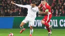 Skor 1-0 untuk kemenangan Real Madrid bertahan hingga akhir babak pertama. (FRED TANNEAU/AFP)
