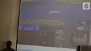Layar monitor memperlihatkan hasil investigasi kecelakaan pesawat Lion Air JT 610 dalam konferensi pers di Kantor KNKT, Jakarta, Jumat (25/10/2019). Ada sembilan faktor yang berkontribusi dalam kecelakaan pesawat Lion Air JT 610 pada 29 Oktober 2018 di Tanjung Karawang. (Liputan6.com/Johan Tallo)