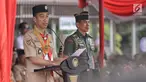 Presiden Joko Widodo memberi sambutan saat menghadiri HUT Pramuka ke-57 di Lapangan Gajah Mada, Jakarta, Selasa (14/8). Dalam Sambutannya, Jokowi berpesan kepada adik-adik Pramuka agar tetap semangat berinovasi dan produktif. (Liputan6.com/Faizal Fanani)