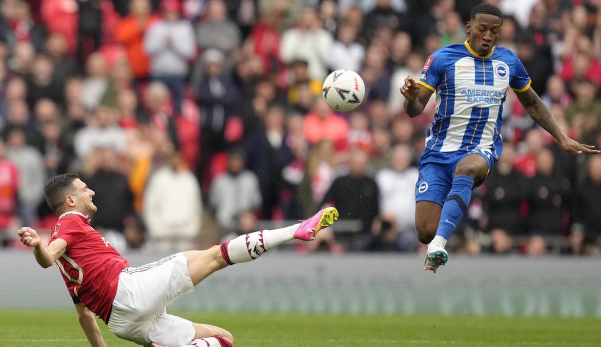 <p>Manchester United lolos ke final Piala FA 2022/2023. MU menang adu penalti melawan Brighton and Hove Albion 7-6. (AP Photo/Kirsty Wigglesworth)</p>