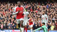 Striker Arsenal Eddie Nketiah berselebrasi setelah mencetak gol ke gawang Sheffield United dalam pertandingan Liga Inggris di Emirates Stadium, London, Sabtu, 28 Oktober 2023. (Glyn KIRK / AFP)