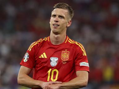 Daniel Olmo merayakan gol bunuh diri Prancis dan gol kedua Spanyol saat laga semifinal Euro 2024 di Arena Sepak Bola Munich di Munich pada 9 Juli 2024. Saat ini, Daniel Olmo sudah mengoleksi tiga gol dan berpeluang meraih gelar pencetak gol terbanyak mengingat Spanyol akan berlaga di final Euro 2024 melawan Inggris. (FRANCK FIFE/AFP)