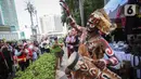 Kegiatan berisi parade seni, budaya, tarian Papua, marching band dari SMA.  (Liputan6.com/Angga Yuniar)