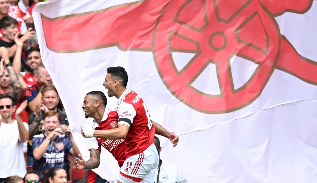 Sebagai salah satu tim Big Six di Liga Inggris, Arsenal selalu berisikan para pemain kelas dunia dari musim ke musim. Di samping membela Arsenal, para pemain terebut juga menjadi andalan negaranya masing-masing dalam setiap turnamen antar-negara seperti Piala Dunia. Tercatat ada 6 pemain yang mampu meraih trofi Piala Dunia bersama timnas masing-masing saat berseragam The Gunners. Siapa saja? Yuk disimak uraiannya berikut ini. (AFP/Justin Tallis)