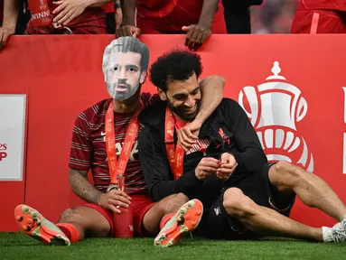 Mohamed Salah merupakan peraih Player of The Month terbanyak dalam satu musim. Pada musim debutnya, sang pemain berhasil menyabet gelar tersebut sebanyak tiga kali. Dalam sejarahnya Liga Inggris, belum ada pemain yang mampu meraih penghargaan tersebut lebih dari dua kali selain Mo Salah. (AFP/Ben Stansall)