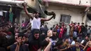 Pengunjuk rasa menuntut segera diakhirinya perang antara Hamas dan Israel. (Foto oleh AFP)