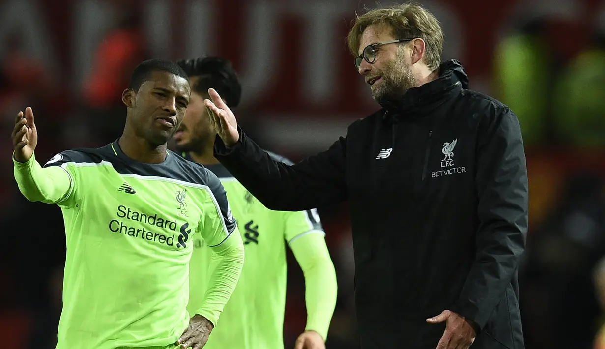 Georginio Wijnaldum. Gelandang berusia 31 tahun yang baru 1 musim memperkuat PSG usai dilepas Liverpool pada awal musim 2021/2022 ini sebenarnya selalu jadi andalan Jurgen Klopp bersama Liverpool selama 5 musim mulai 2016/2017 hingga 2020/2021. Sempat akan bergabung dengan Barcelona dengan status bebas transfer, namun di saat-saat akhir justru menuju PSG dengan iming-iming gaji berlipat, hingga akhirnya ia resmi berseragam PSG sejak awal musim 2021/2022. Nyatanya, peanmpilannya di PSG justru mengecewakan dan banyak menuai kritik. (AFP/Oli Scarff)