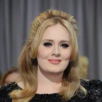 “Kadang-kadang ia memberikan isyarat pada Simon saat berbincang dan Simon pun menerjemahkan untuk orang lain,” pungkas sumber. (AFP/FREDERIC J. BROWN)