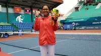 Dwi Rahayu Puteri, peraih medali Perunggu di cabor soft tenis nomor tunggal puteri (Liputan6.com / Nefri Inge)