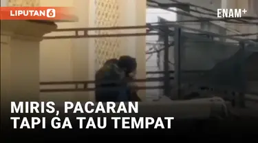 Pasangan Sejoli Bermesraan di Atas Masjid