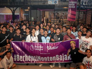 Fans Man City dan Arsenal harus puas tim kesayangannya yang sama-sama berpeluang besar menjuarai Liga Inggris musim ini berbagi poin saat bermain imbang 0-0 di acara Roaring Night Liga Inggris 2023/2024 antara Manchester City melawan Arsenal di Hype Cafe, Depok, Minggu (31/3/2024) malam. Acara tersebut terselenggara atas kolaborasi komunitas Manchester City Supporters Club Indonesia (MCSC Indonesia) dan MCSC Regional Depok dengan Vidio, Bola.com dan Bola.net sebagai sponsor. (Bola.com/Abdul Aziz)