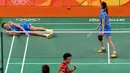 Tontowi Ahmad/Liliyana Natsir berhasil mengalahkan pemain Tiongkok Zhang Nan/Zhao Yunlei di semifinal bulutangkis Olimpiade Rio 2016, Brasil, Senin (15/8). Tontowi/Liliyana menang dengan 21-16, 21-15. (REUTERS)