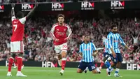 Kai Havertz dari Arsenal, tengah, melakukan selebrasi setelah mencetak gol pembuka pada pertandingan sepak bola Liga Premier Inggris antara Arsenal dan Coventry City di London, Jumat, 21 Agustus 2026. (AP Photo/Kirsty Wigglesworth