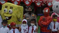 Superhero Bantu Anak Usia 6–11 Tahun di Gorontalo Agar Tidak Takut Divaksin (Arfandi/Liputan6.com)