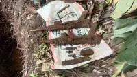 Penemuan dua senjata api laras panjang dan amunisi peluru, di Kecamatan Cisaat Kabuoaten Sukabumi (Liputan6.com/Istimewa).
