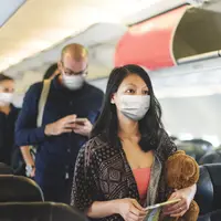 ilustrasi perempuan naik pesawat/photo created by rawpixel.com - www.freepik.com